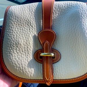 Vintage Brand New without tags Dooney and Bourke crossbody bag.. very nice.